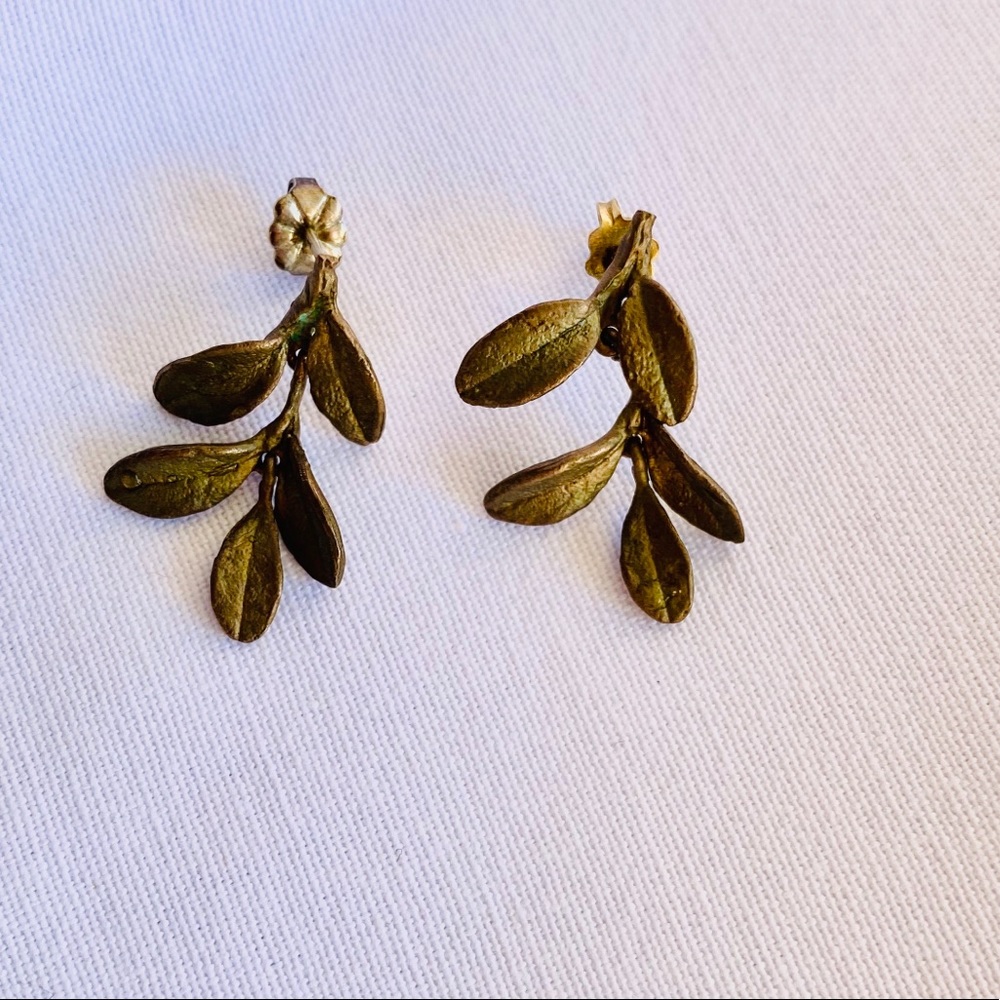 Michael Michaud pierced earrings.